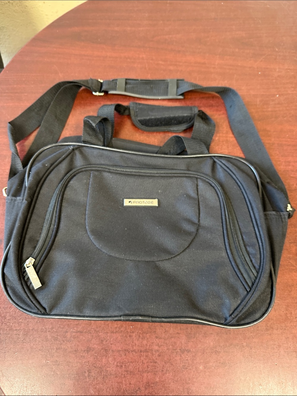 ##890, Black Shoulder Bag with Multiple Compartments